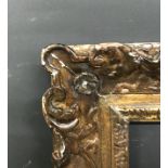 19th Century English School. A Carved Giltwood Swept Corers Frame, 21.25" x 17.25" (rebate), and the
