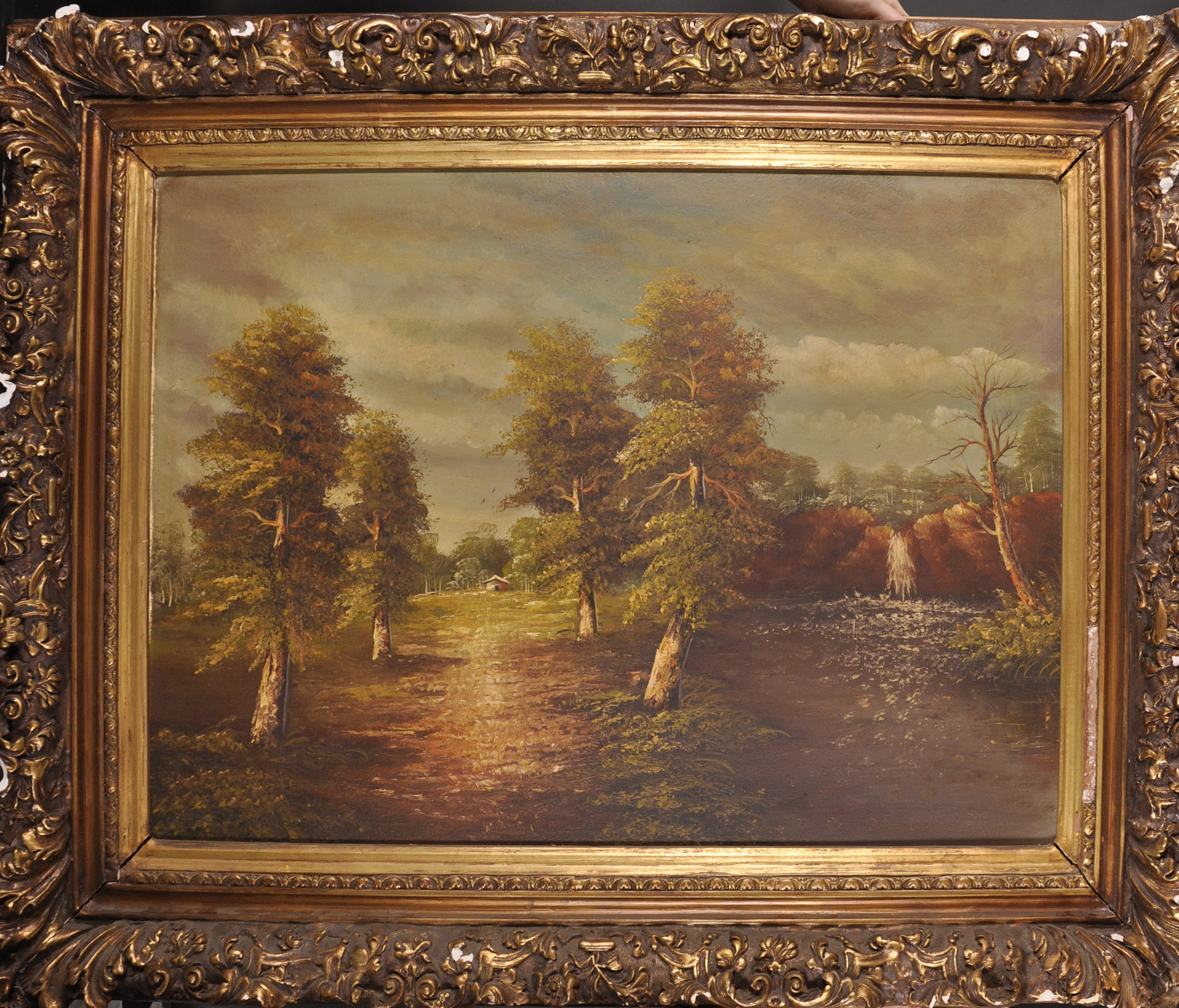 Late 19th Century Continental School. A River Landscape, Oil on Canvas, 28" x 39.5".