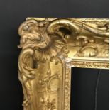 19th Century English School. A Gilt Composition Frame with Swept and Pierced Centres and Corners,