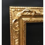 20th- 21st Century English School Style. A Carved Gilt Swept and Pierced Corners Frame, 30.25" x