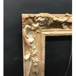 20th Century English School. A Gilt Composition Frame with Swept Centres and Corners. 35" x 31" (