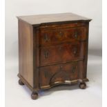 AN 18TH CENTURY STYLE WALNUT BACHELORS CHEST, with brushing slide, three drawers, the lower drawer