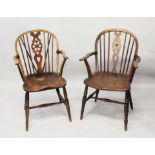 A PAIR OF 18TH CENTURY WHEEL BACK ELM AND YEW WOOD ARMCHAIRS.