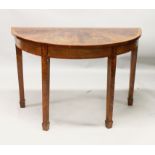 A GEORGE III DESIGN MAHOGANY DEMILUNE SIDE TABLE, on tapering square legs with spade feet. 3ft 11ins