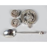 A "THISTLE" SILVER TEASPOON by CHARLES HORNER (CHESTER), plus three "Clan" badges (two silver).