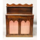 A GOOD REGENCY ROSEWOOD CHIFFONIER, a small shelf supported on turned pillars, fitted with frieze