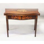 A GEORGE III MAHOGANY AND MARQUETRY FOLD-OVER CARD TABLE, of serpentine outline with a frieze