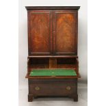 A LATE 18TH CENTURY MAHOGANY SECRETAIRE CABINET, the upper part fitted with three trays as a linen