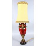 AN EARLY 20TH CENTURY URN SHAPE POTTERY LAMP, with ornate ormolu mounts depicting stylised birds, on