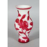 A PEKING GLASS VASE, with red leaf decoration. 5.5ins high.