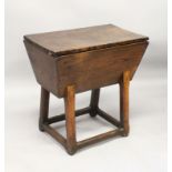 A SMALL 18TH CENTURY ELM DOUGH BIN with lift off lid, on rustic legs with plain united stretchers.
