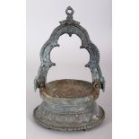 AN 18TH/19TH CENTURY NEPALESE HANGING BRONZE OIL LAMP, with a lotus cast base, 8.2in high overall.