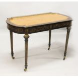 A GOOD VICTORIAN COROMANDEL WRITING TABLE, with gilt tooled inset leather top, brass gallery, raised