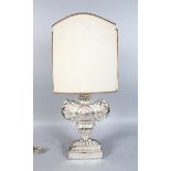 A SILVER GILT LAMP.