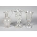 AN ENGRAVED CELERY VASE, CUT VASE AND CLARET JUG (3).