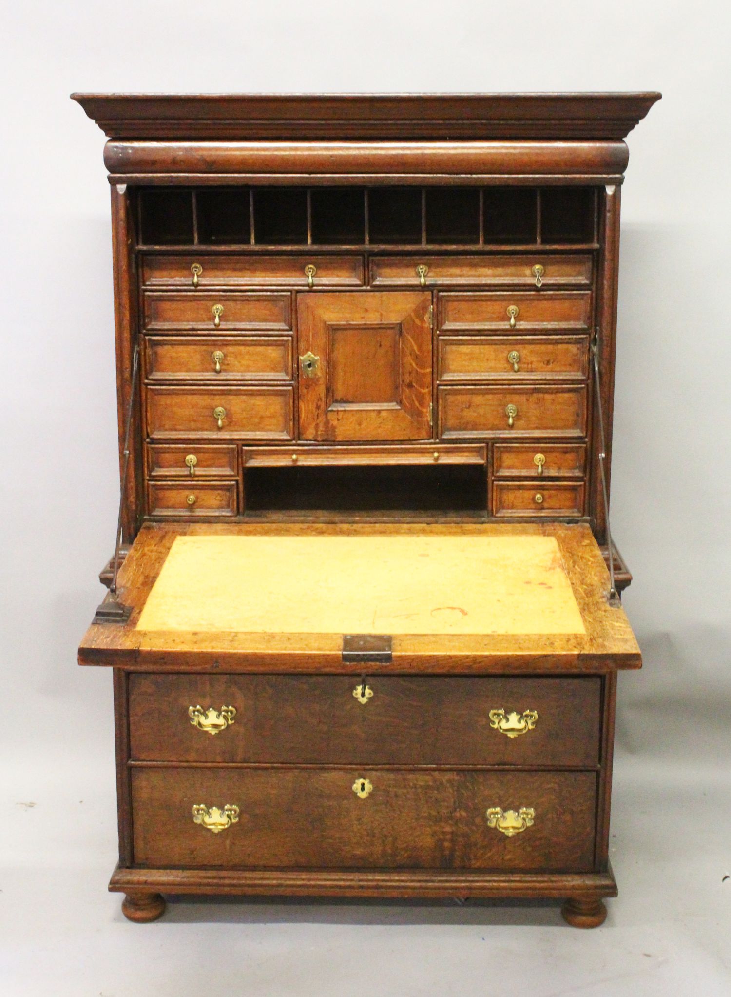 AN 18TH CENTURY OAK ESCRITOIRE, with frieze drawer, panelled drop flap opening to reveal a cupboard,