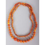 ANOTHER AMBER NECKLACE, weighing approx. 37.5gm, composed of graduated spherical beads, approx. 41in