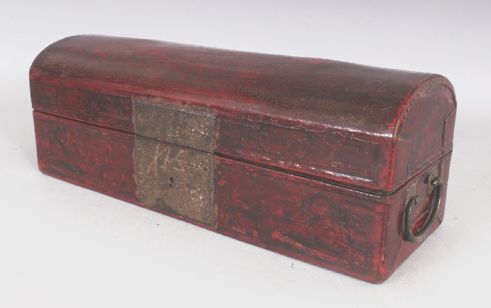 AN UNUSUAL 19TH CENTURY CHINESE LEATHER CLAD RECTANGULAR CASKET, the domed cover and sides decorated