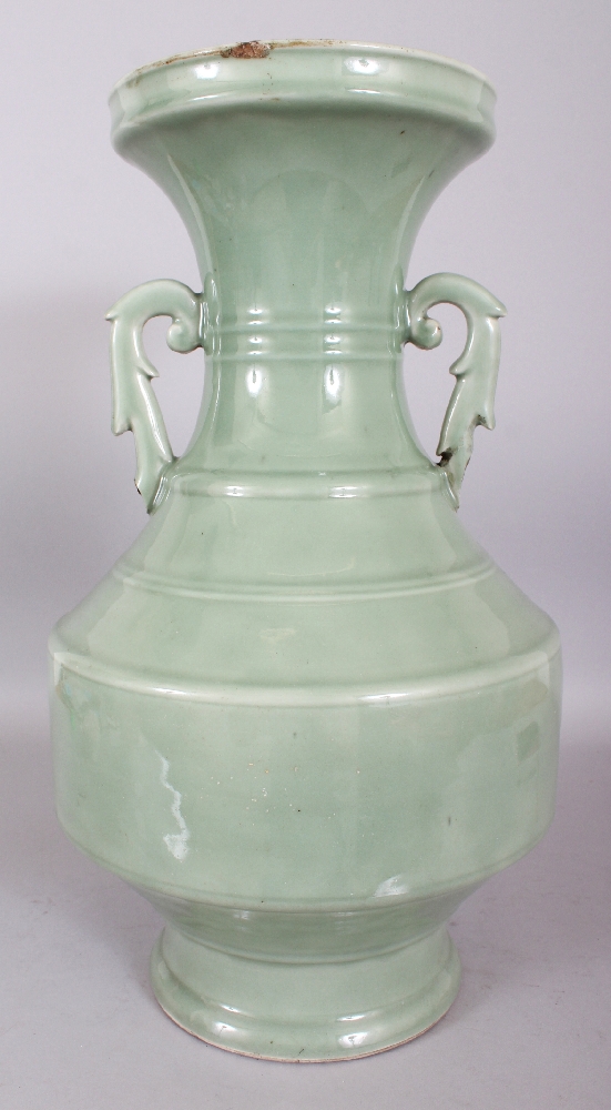 A LARGE 19TH CENTURY CHINESE CELADON PORCELAIN VASE, moulded with double scroll acanthus handles,