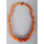 ANOTHER GOOD QUALITY AMBER EGG BUTTERSCOTCH NECKLACE, weighing approx. 26.5gm, composed of graduated