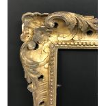 Late 18th Century English School. A Carved Giltwood Frame, with Swept and Pierced Centres and