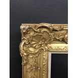 20th Century French School Style. A Gilt Composition Frame with Swept Corners, 28" x 20" (rebate).