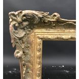 20th Century English School. A Gilt Composition Frame with Swept Centres and Corners, 49" x 37" (