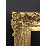 19th Century English School. A Gilt Composition Swept Centres and Corners Frame, 30" x 22" (