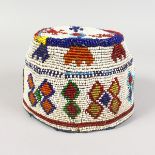 A BEAD WORK HAT.