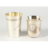 TWO CONTINENTAL SILVER BEAKERS.