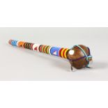 A ZULU MASSI KNOBKERRIE, with bead decoration. 16ins long.