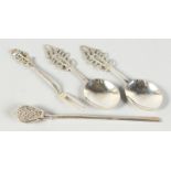 A TEA INFUSER, a pair of .800 spoons with pierced handles and a fork with rose handle (4).