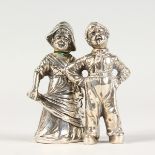 A PAIR OF SILVER DUTCH BOY AND GIRL SALT AND PEPPERS. 3.5ins high.