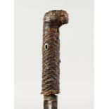 AN AFRICAN SWORD STICK, with bird handle. 3ft long.