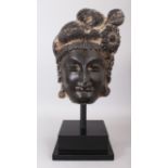 A VERY GOOD BLACK SCHIST STONE BUDDHA BHODIVISTA HEAD. 12ins, on a stand.