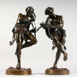 A VERY GOOD PAIR OF 19TH CENTURY FRENCH BRONZE FIGURES, playing musical instruments, standing on