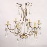 A GILT METAL AND CUT GLASS SIX BRANCH CHANDELIER, with large prism drops and star shape sconces. 2ft