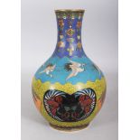 AN UNUSUAL JAPANESE MEIJI PERIOD CLOISONNE BOTTLE VASE, the sides with a variety of designs in