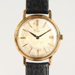 A ROLEX GOLD TUDOR WRISTWATCH with leather strap.
