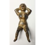 AN EARLY GILDED CAST IRON NUDE. 9.5ins high.