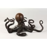AN UNUSUAL LARGE BRONZE MODEL OF AN OCTOPUS. 29ins wide x 13ins high.