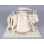 AN UNUSUAL GOOD QUALITY 19TH CENTURY INDIAN SECTIONAL IVORY GROUP OF AN OX DRIVER, weighing