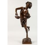 AFTER GUILLAUME (1677-1746) A GOOD BRONZE OF A YOUNG BOY, running holding a cloth and basket.