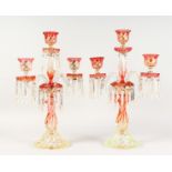 A SUPERB PAIR OF BACCARAT TWO-COLOUR GLASS TABLE CANDELABRA, with three candle sconces, pair of