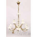 A VENETIAN STYLE GLASS NINE BRANCH, TWO-TIER CHANDELIER. 1ft 8ins high x 1ft 10ins wide.