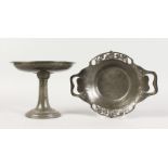 A TUDRIC PEWTER COMPORT AND DISH (2).