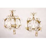 A PAIR OF GILT METAL AND CUT GLASS FOUR BRANCH CHANDELIERS, of naturalistic form with cut glass