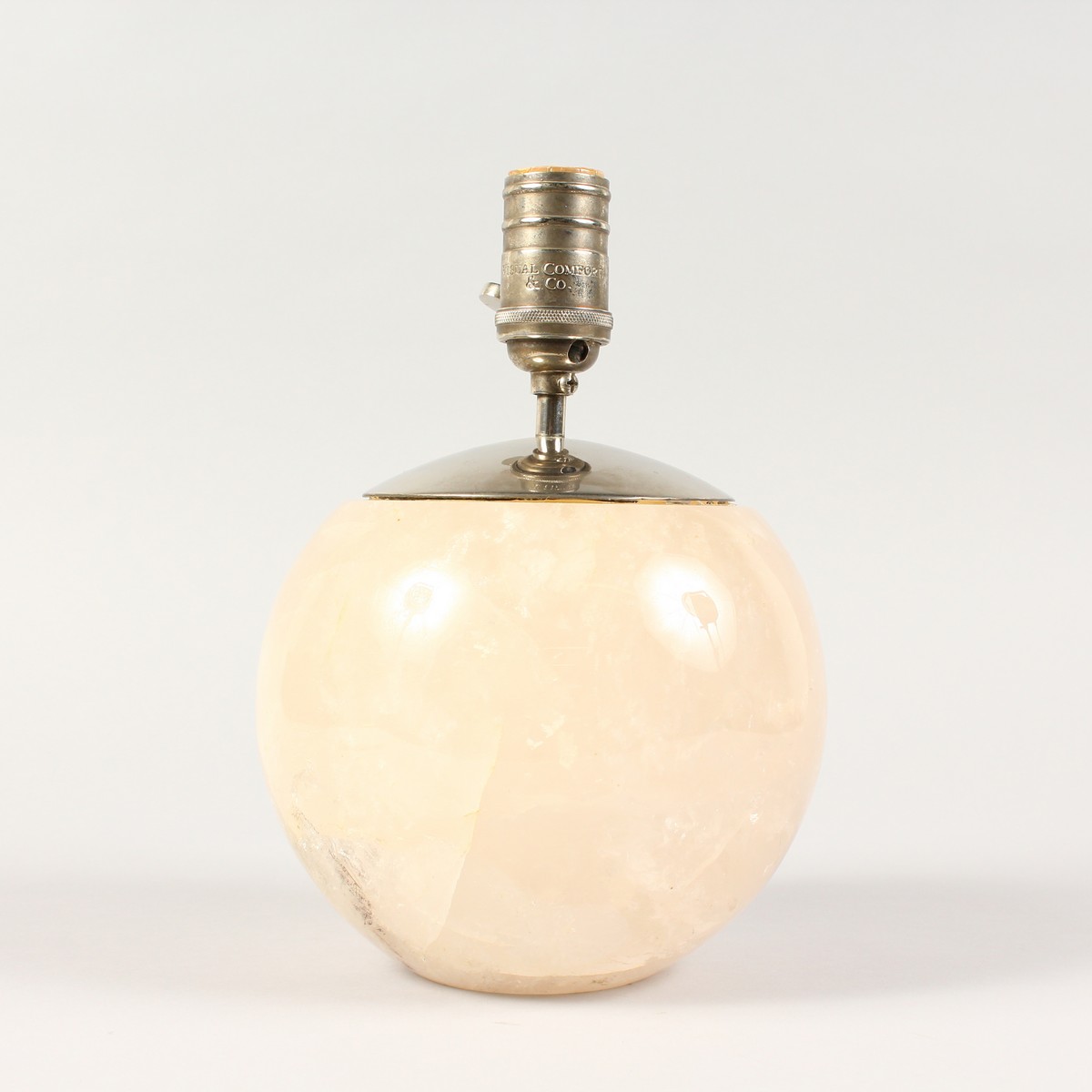 A ROCK CRYSTAL AND CHROME PLATED BALL SHAPE LAMP BASE. 10ins high.