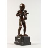 RUDOLF MARCUSE (1878-1940) GERMAN A NUDE BRONZE BOY holding a Teddy Bear. Signed. 8ins high, on a