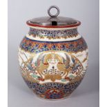 AN IMPERIAL JAPANESE SATSUMA POT, with plated lid, the body painted in blue and gold. 5ins high.